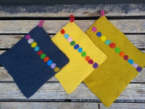 Pot Holders with a line of coloured dots